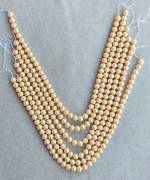 *Sei (6) fili di perle giapponesi colore avorio lunghezza cm. 45, da infilare anni 90