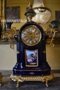 Orologio con coppia di vasi in porcellana blu cobalto