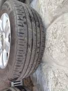 4 cerchi in lega in ottime condizioni + pneumatici 205/55 R16 V Continental all' 80%