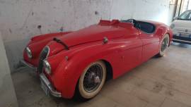 lotto 1 AUTOVETTURA STORICA JAGUAR XK 120 COUPE' DI COLORE ROSSO TARGATA GE230ZZ